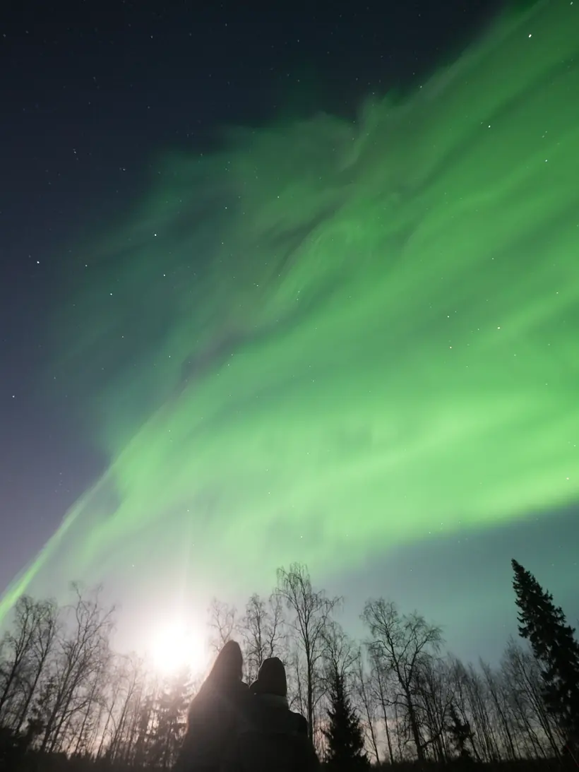 Northern lights over Rovaniemi on an aurora hunting tour